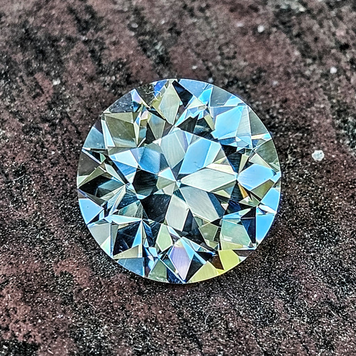 Aqua Colored Repurposed Laser Garnet, Traditional Round Brilliant Cut, 7.1 Carats