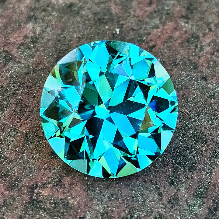 Teal "Paraiba" YAG, Traditional Round Brilliant Cut, 30.62 Carats