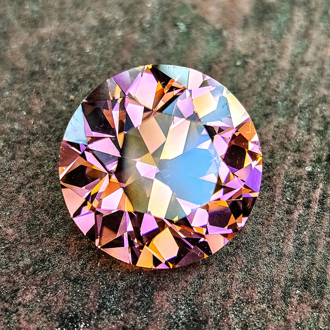 Tangerine Laser Garnet, Traditional Round Brilliant Cut, 64.60 Carats