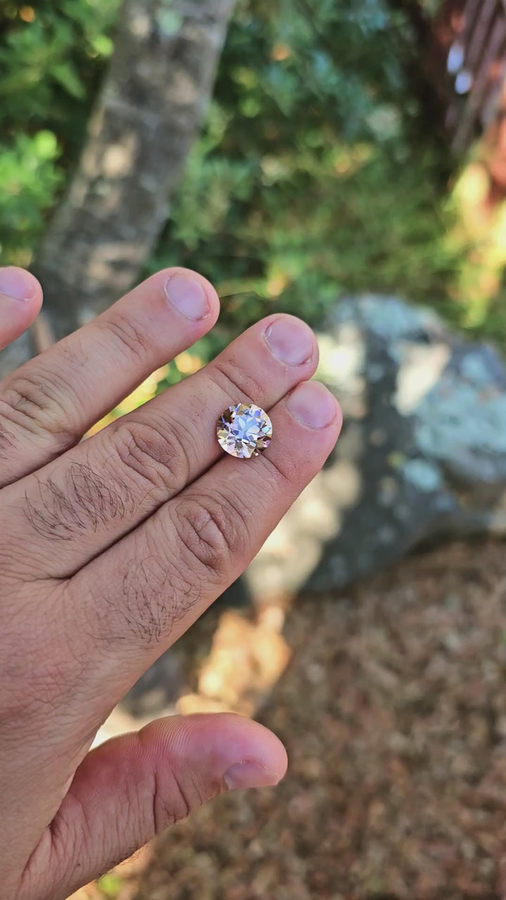 Purple Neodymium+ YAG, Traditional Round Brilliant Cut, 9.08 Carats