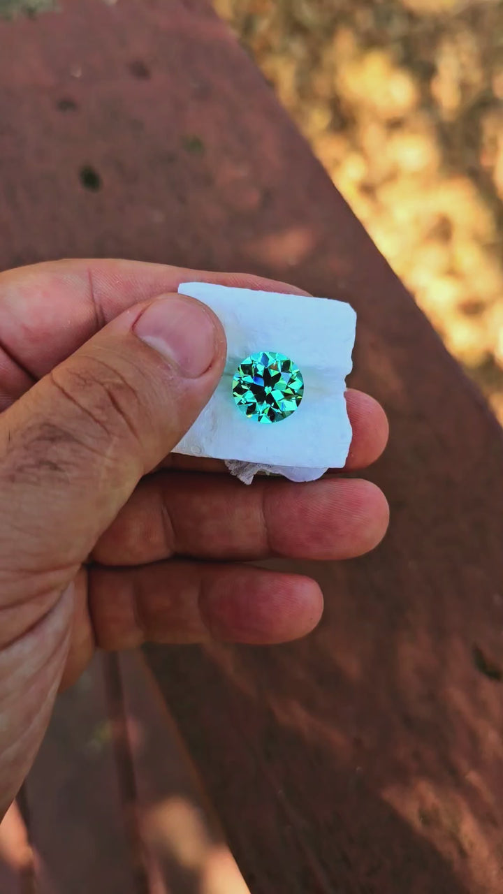 Teal "Paraiba" YAG, Traditional Round Brilliant Cut, 13.64 Carats