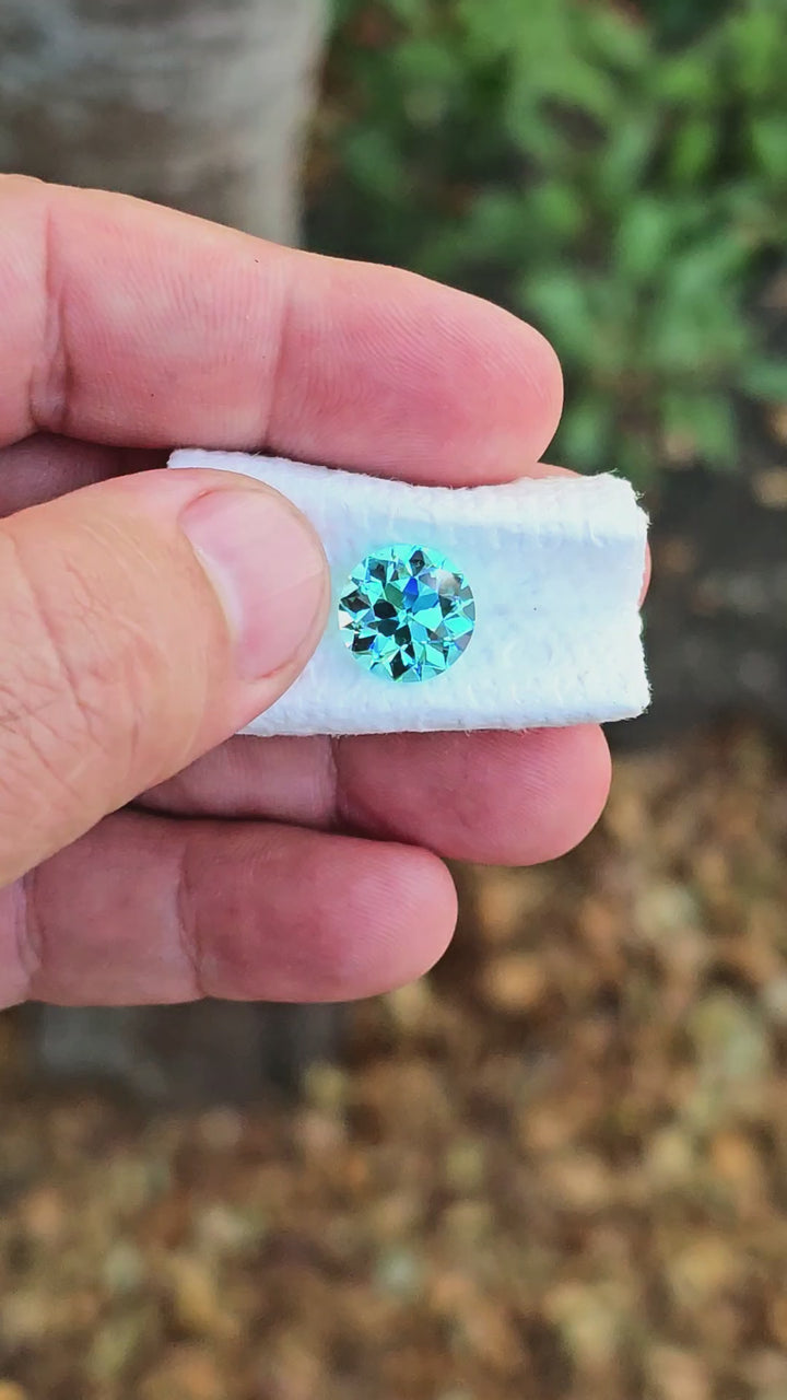 Teal "Paraiba" YAG, Traditional Round Brilliant Cut, 8.33 Carats