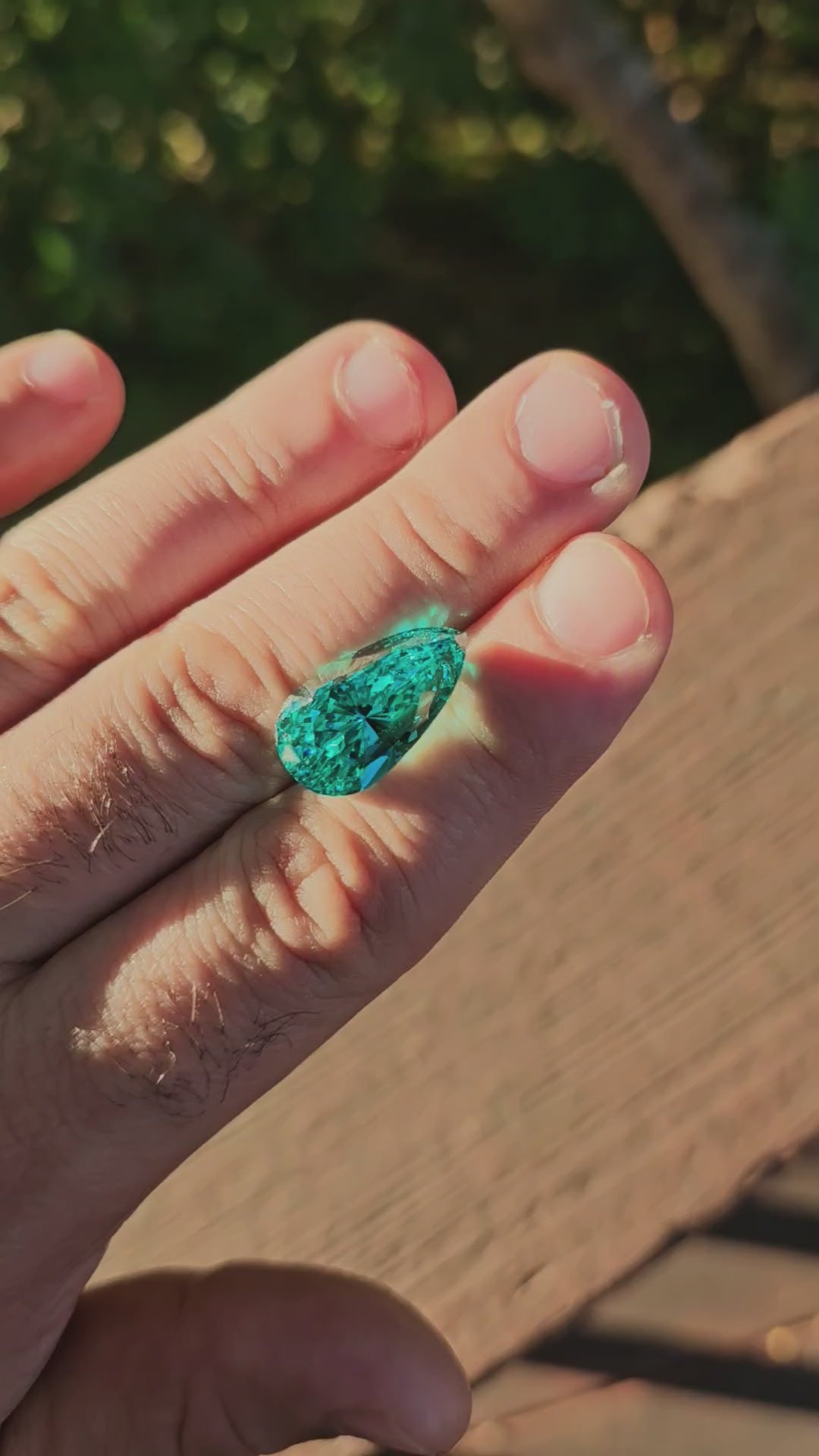 Teal "Paraiba" YAG, Pear Internal Reflections Cut,  22 Carats