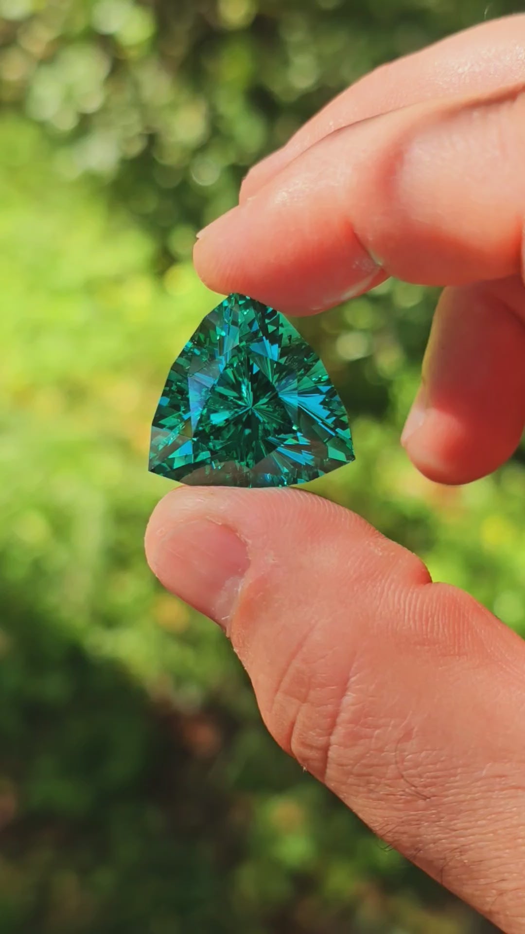 Teal "Paraiba" YAG, Trillian Internal Reflections Cut, 52.4 Carats