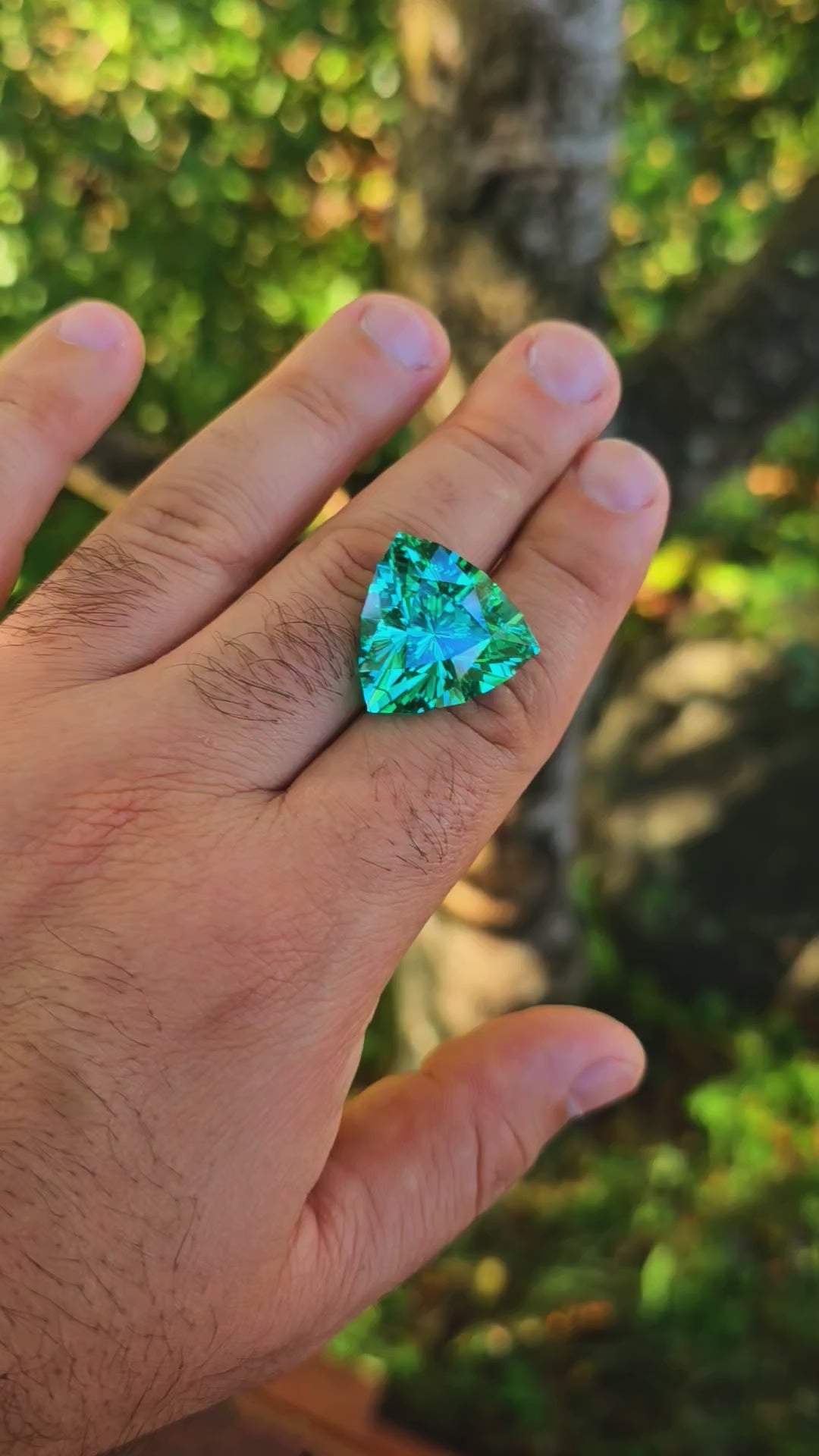 Repurposed Teal "Paraiba" YAG, Trillian Internal Reflections Cut, 52.4 Carats
