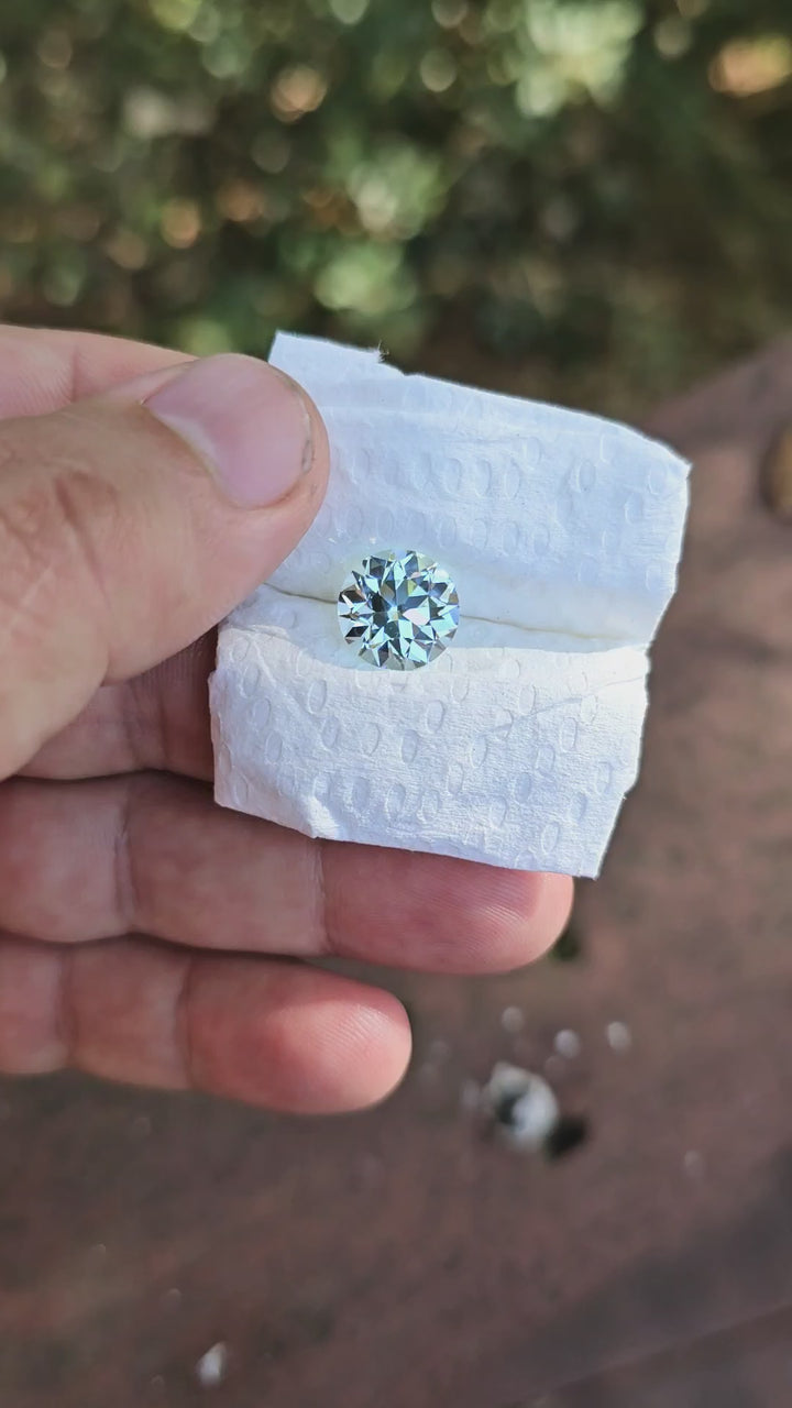 Aqua Colored Repurposed Laser Garnet, Traditional Round Brilliant Cut, 7.1 Carats