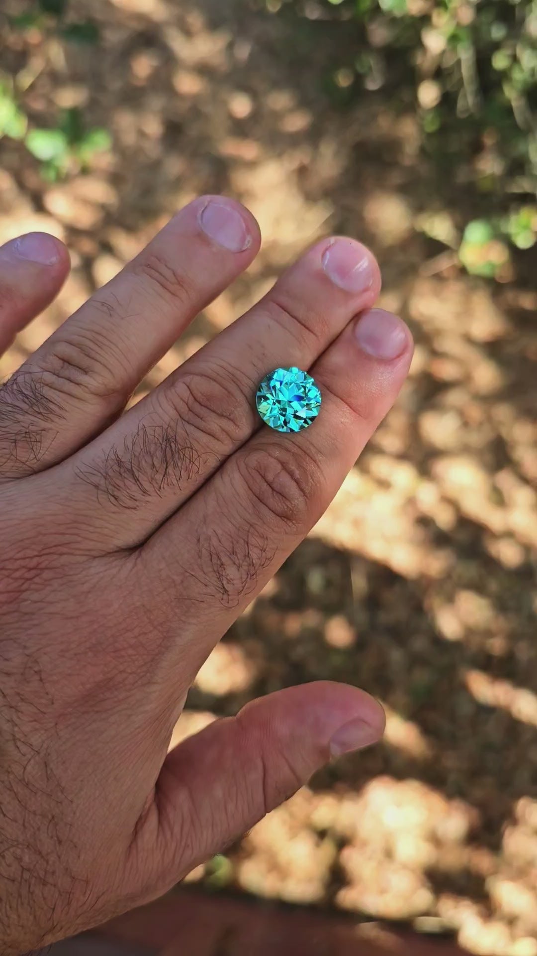 Teal "Paraiba" YAG, Traditional Round Brilliant Cut, 13.64 Carats