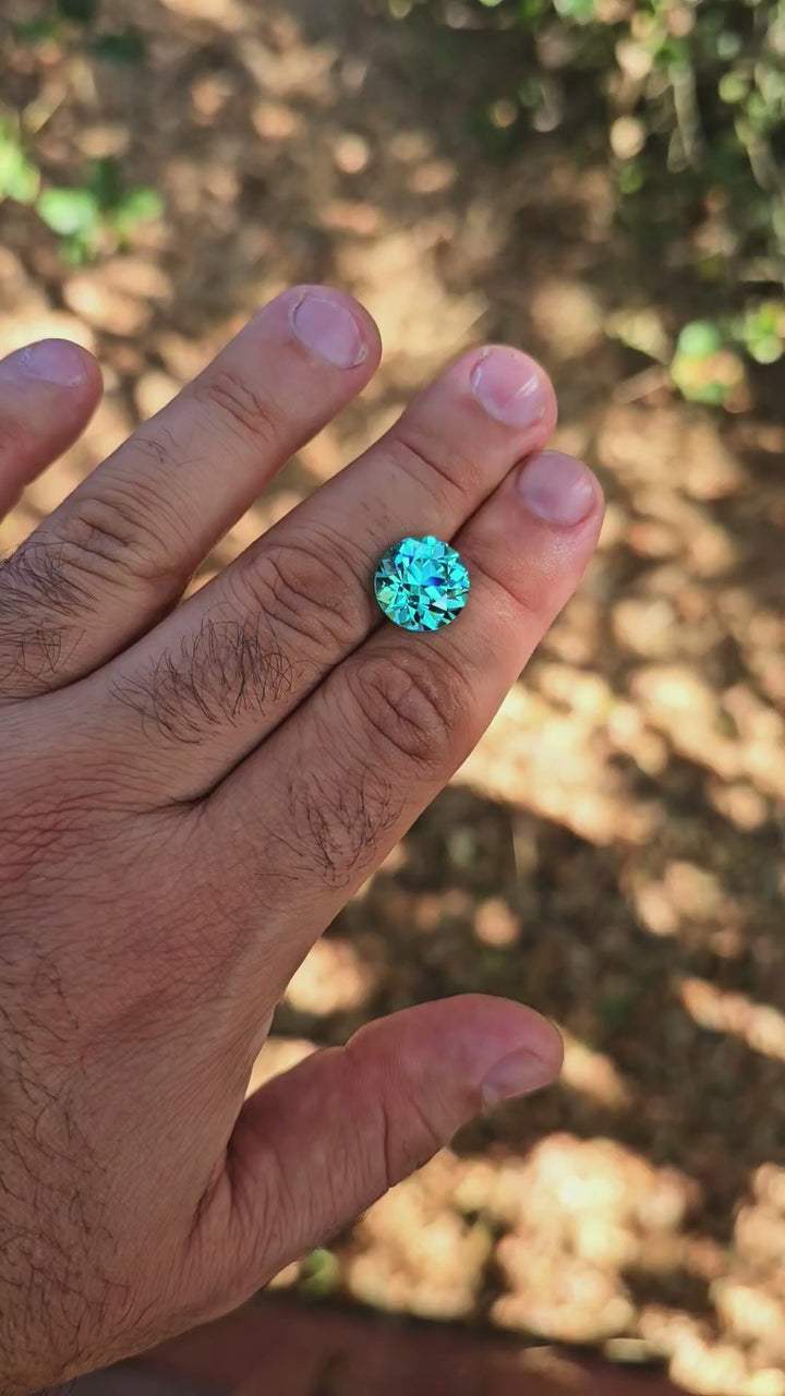 Teal "Paraiba" YAG, Traditional Round Brilliant Cut, 13.64 Carats