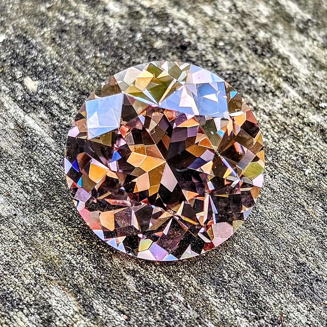 Purple Neodymium+ YAG, House Of Sylas Round Cut, 19.29 Carats - DJEVA