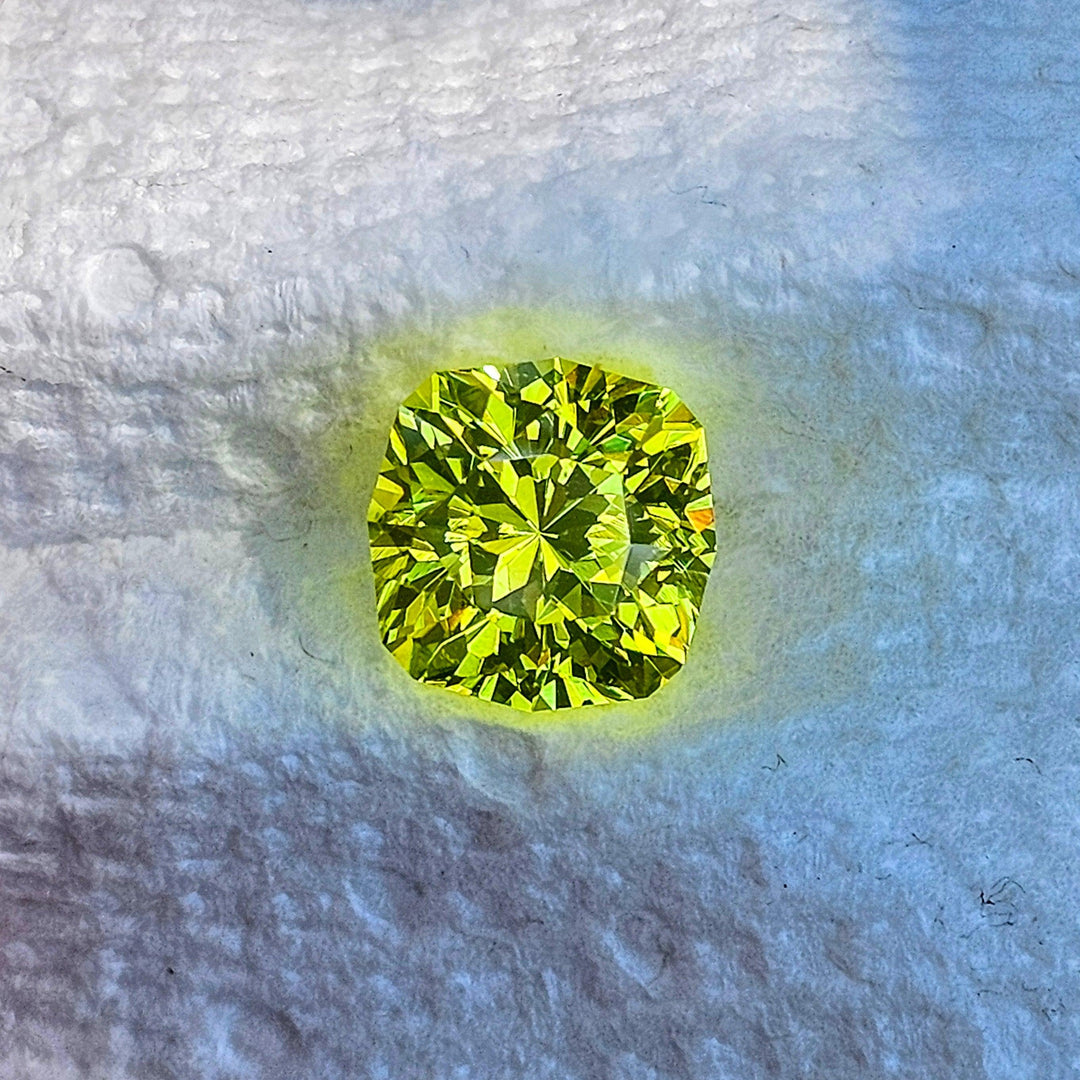 "Ultra" Glow In The Dark Lab Garnet, House Of Sylas Cushion Cut, 19.1 Carats - DJEVA