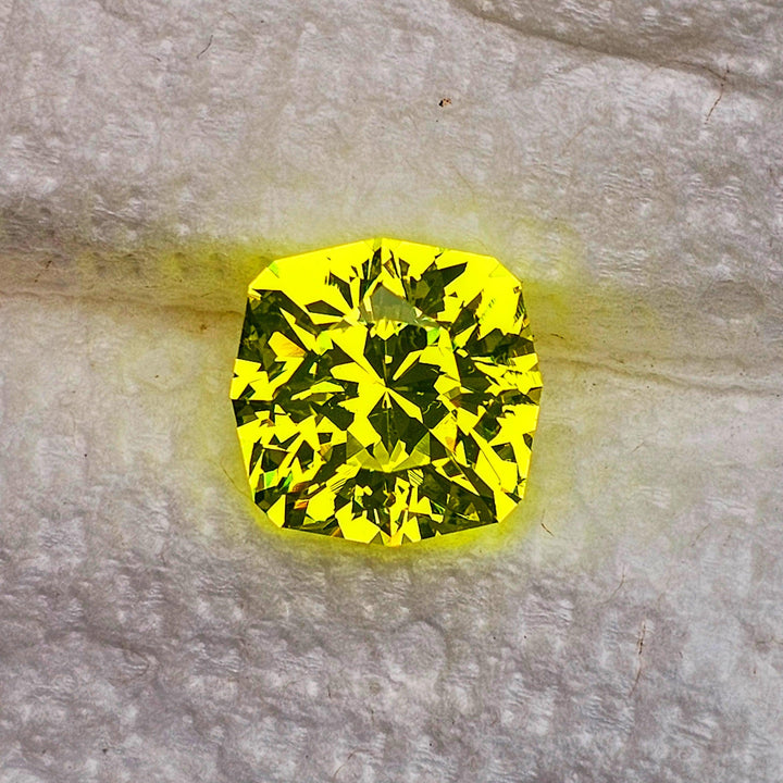 "Ultra" Glow In The Dark Lab Garnet, House Of Sylas Cushion Cut, 20.25 Carats - DJEVA