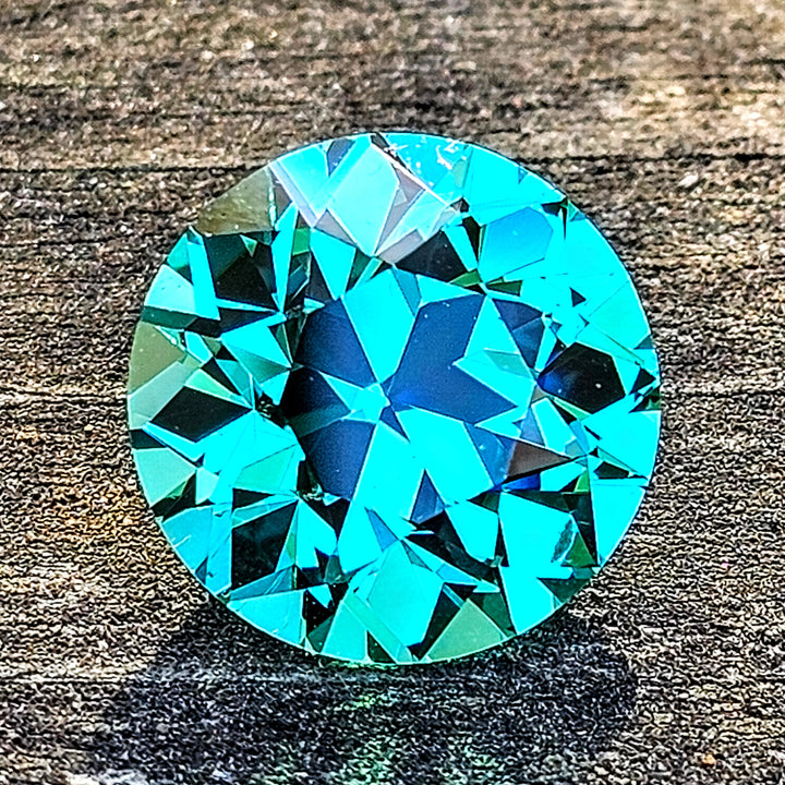 Teal "Paraiba" YAG, Traditional Round Brilliant Cut, 9.11 Carats