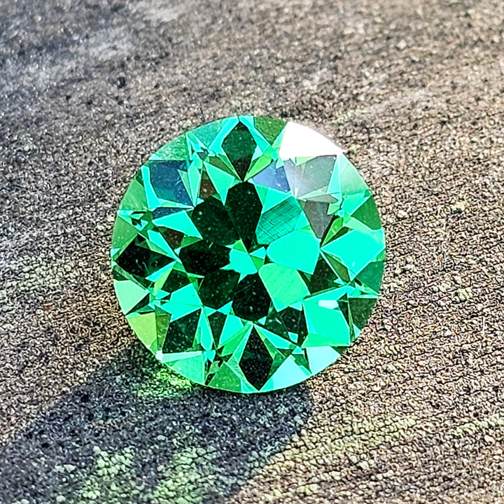 Vivid Green Vanadium YAG, Traditional Round Brilliant Cut, 4.95 Carats