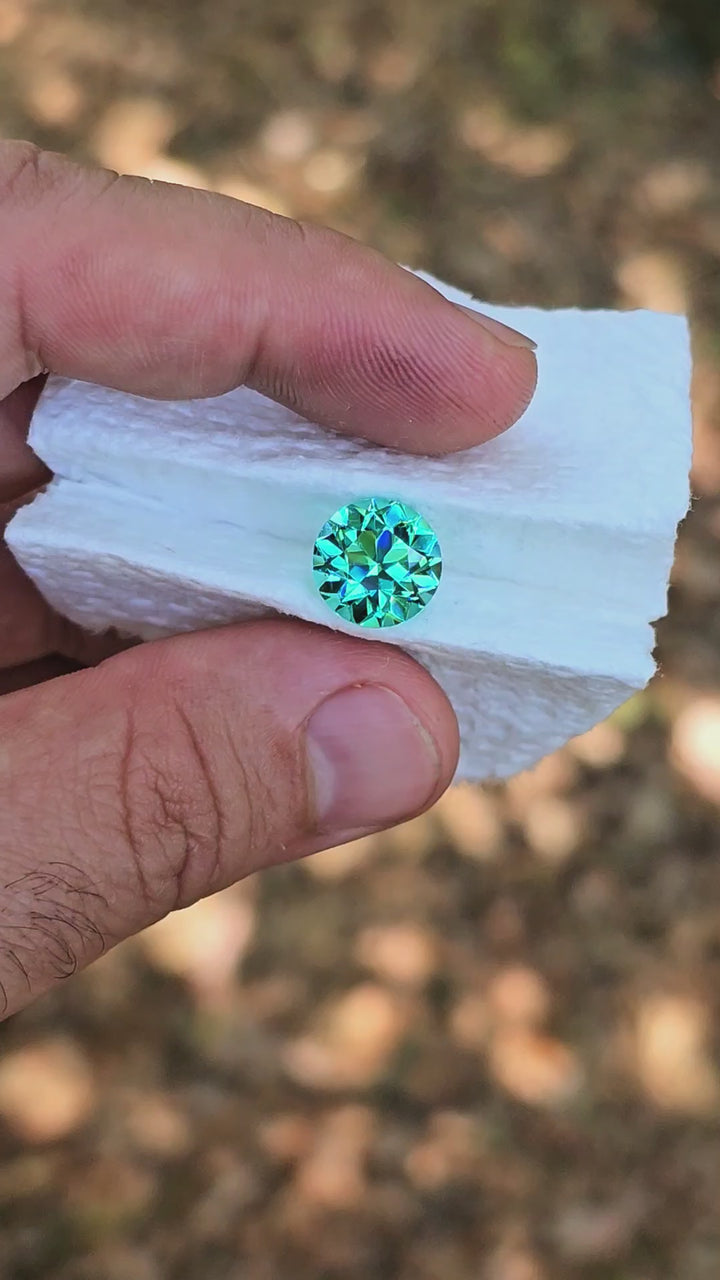 Teal "Paraiba" YAG, Traditional Round Brilliant Cut, 7.95 Carats