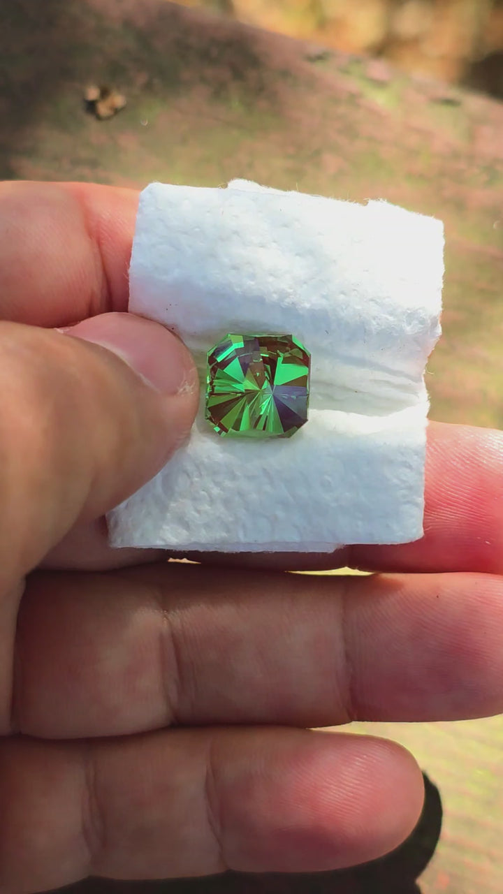 Kyroupolos Green and Red Christmas Garnet, Tessellation Cut, 10.60 Carats