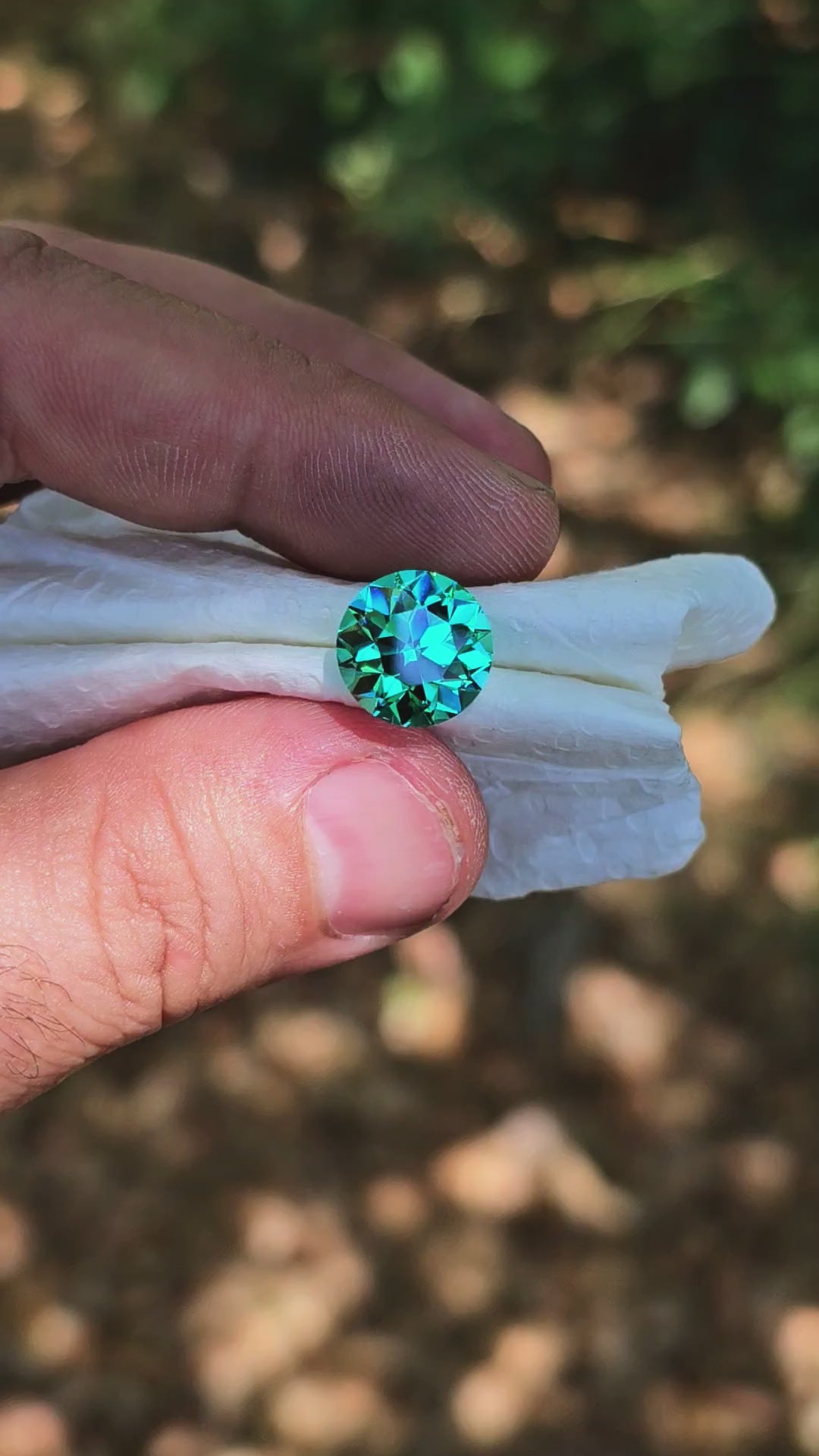 Teal "Paraiba" YAG, Traditional Round Brilliant Cut, 9.72 Carats