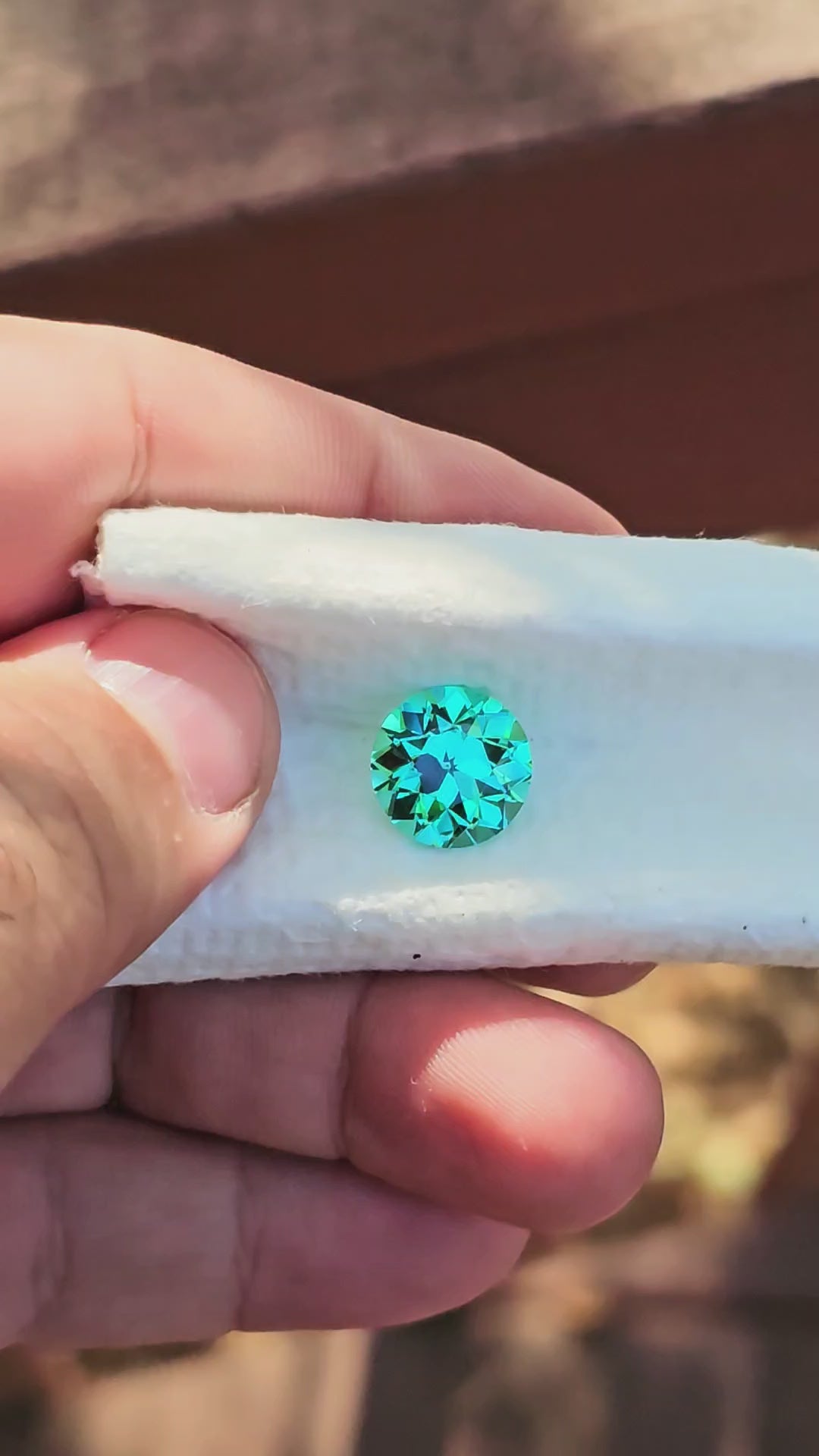 Teal "Paraiba" YAG, Traditional Round Brilliant Cut, 9.11 Carats