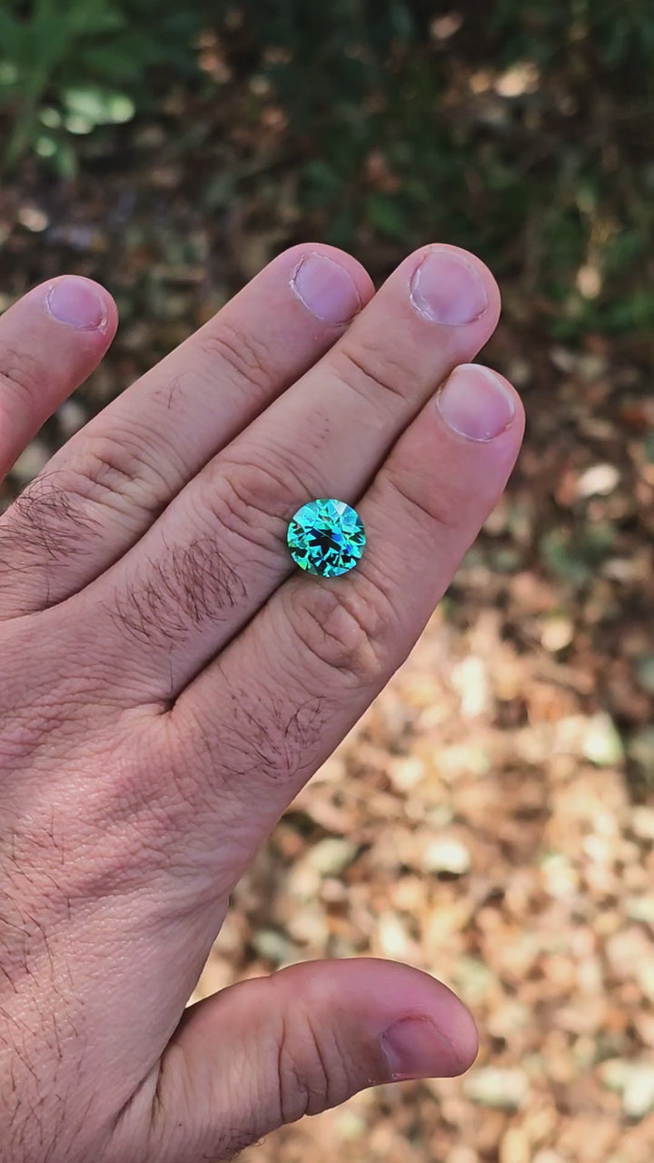 Teal "Paraiba" YAG, Traditional Round Brilliant Cut, 9.11 Carats