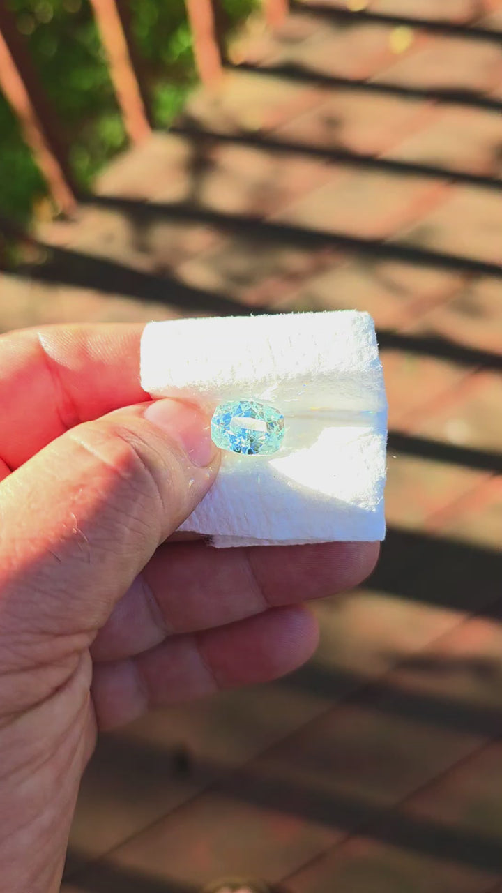 Aqua Colored Repurposed Laser Garnet, Cushion Internal Reflections Cut, 7.70 Carats
