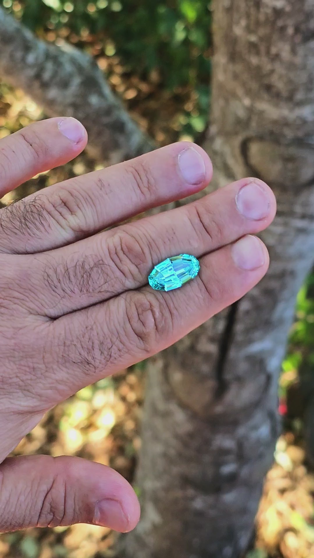 Teal "Paraiba" YAG, Long Step Oval Cut, 9.96 Carats