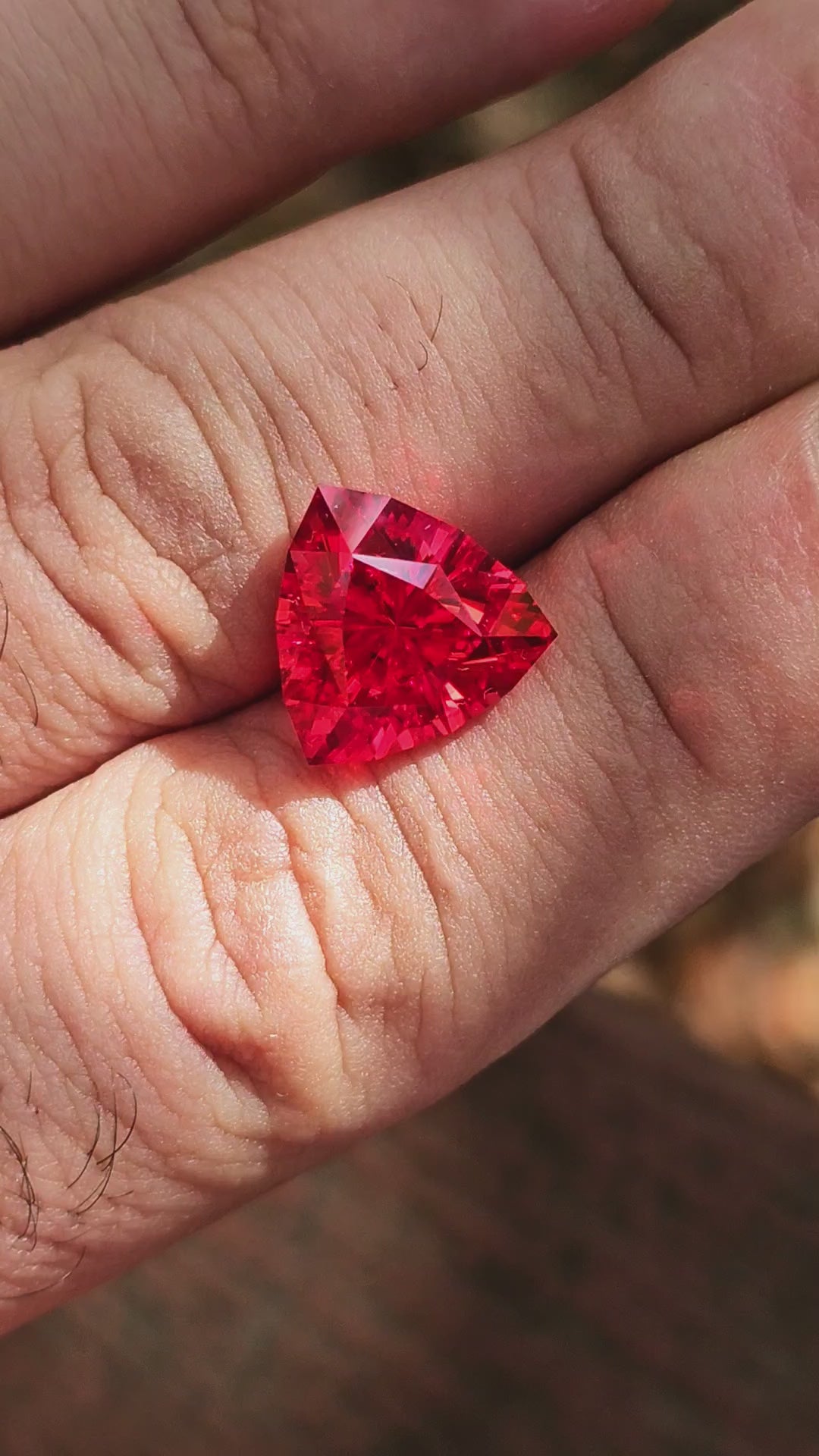 Fire Orange Lab Sapphire, Trillian Internal Reflections Cut, 8.15 Carats