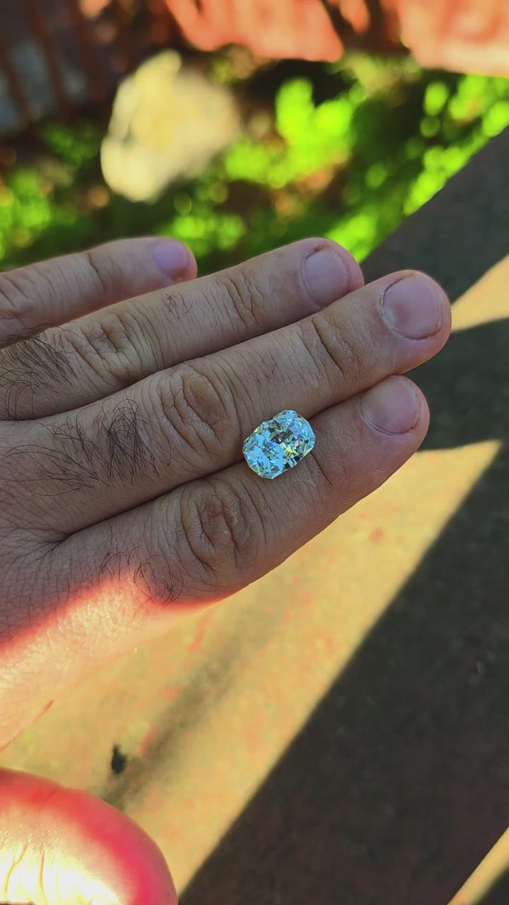Aqua Colored Repurposed Laser Garnet, Cushion Internal Reflections Cut, 7.70 Carats