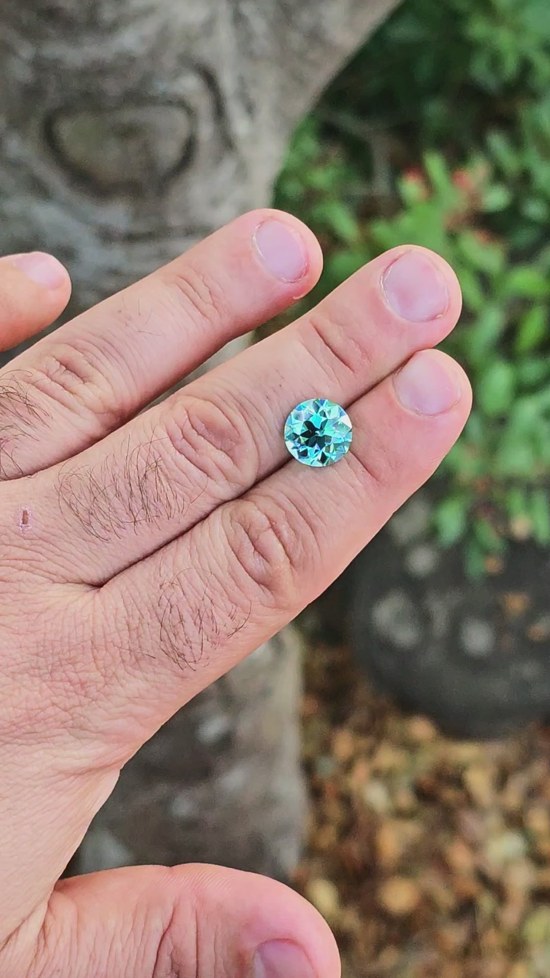 Teal "Paraiba" YAG, Traditional Round Brilliant Cut, 8.33 Carats