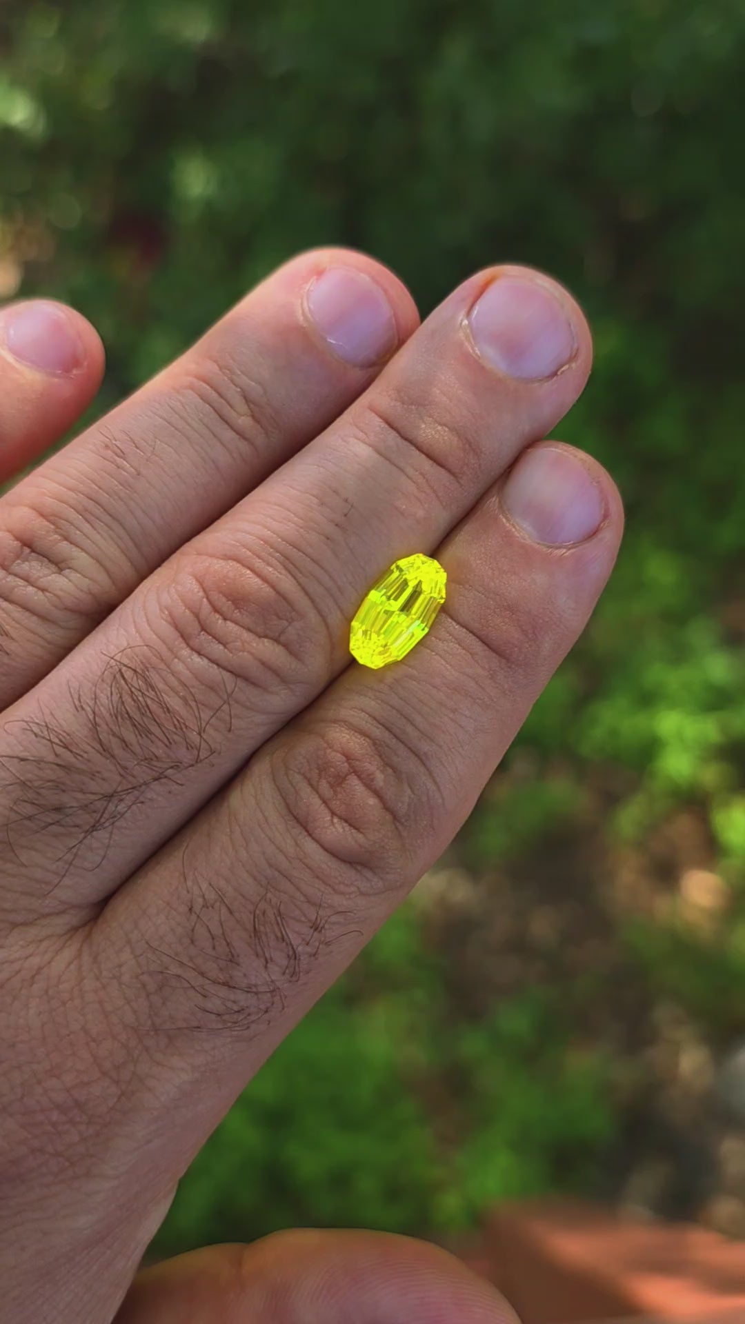 "Ultra" Glow In The Dark Lab Garnet, Long Step Oval Cut, 6.30 Carats