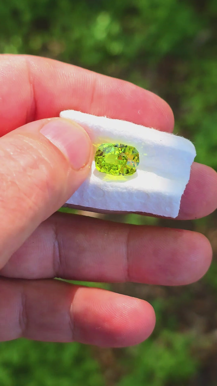 Peridot Green Colored Lab Sapphire, Cushion Internal Reflections Cut, 5.18 Carats