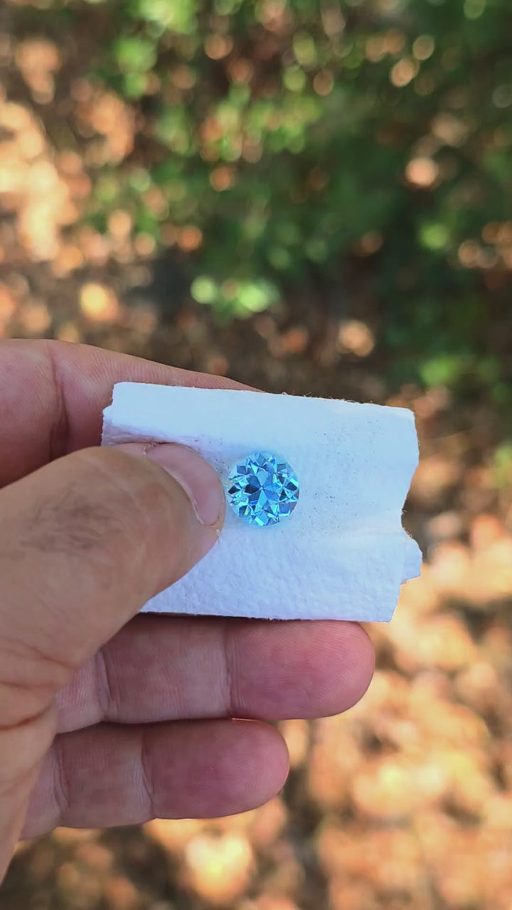 Aqua Blue Lab Sapphire, Traditional Round Brilliant Cut, 7.27 Carats