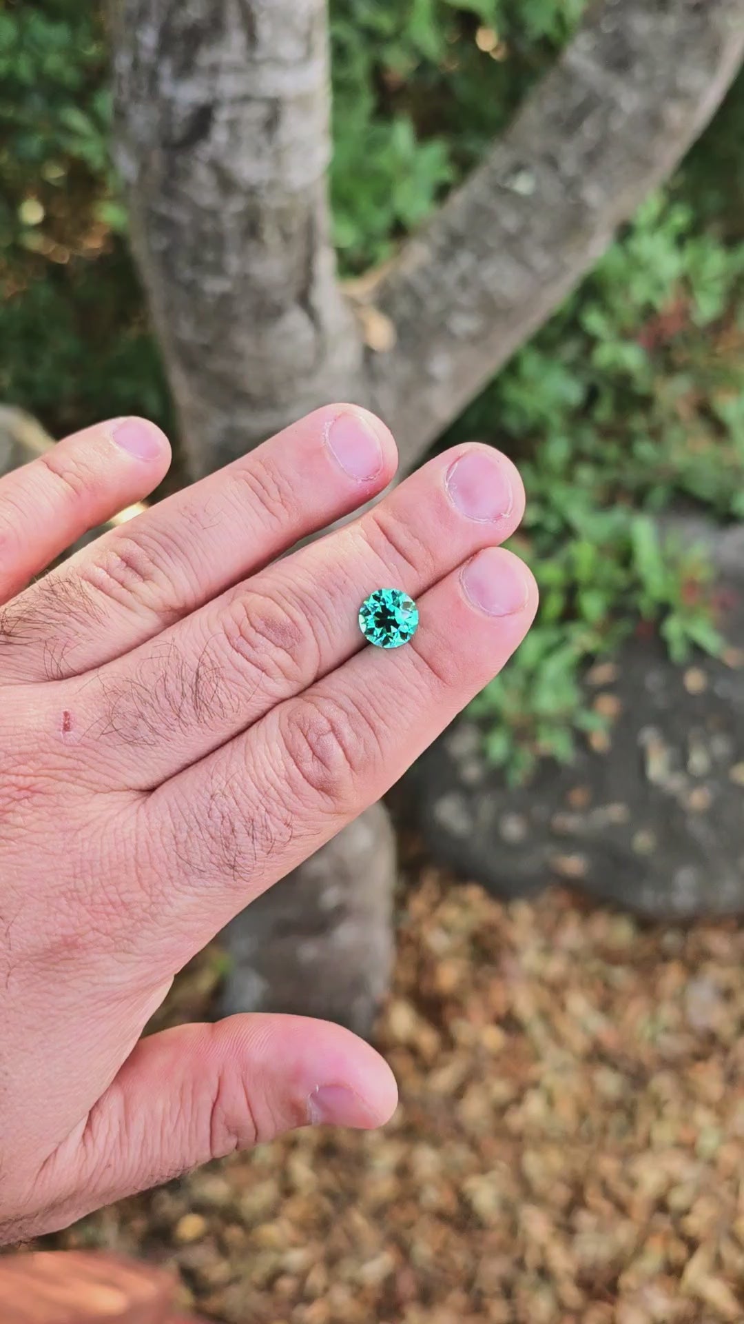 Teal "Paraiba" YAG, Traditional Round Brilliant Cut, 5.21 Carats