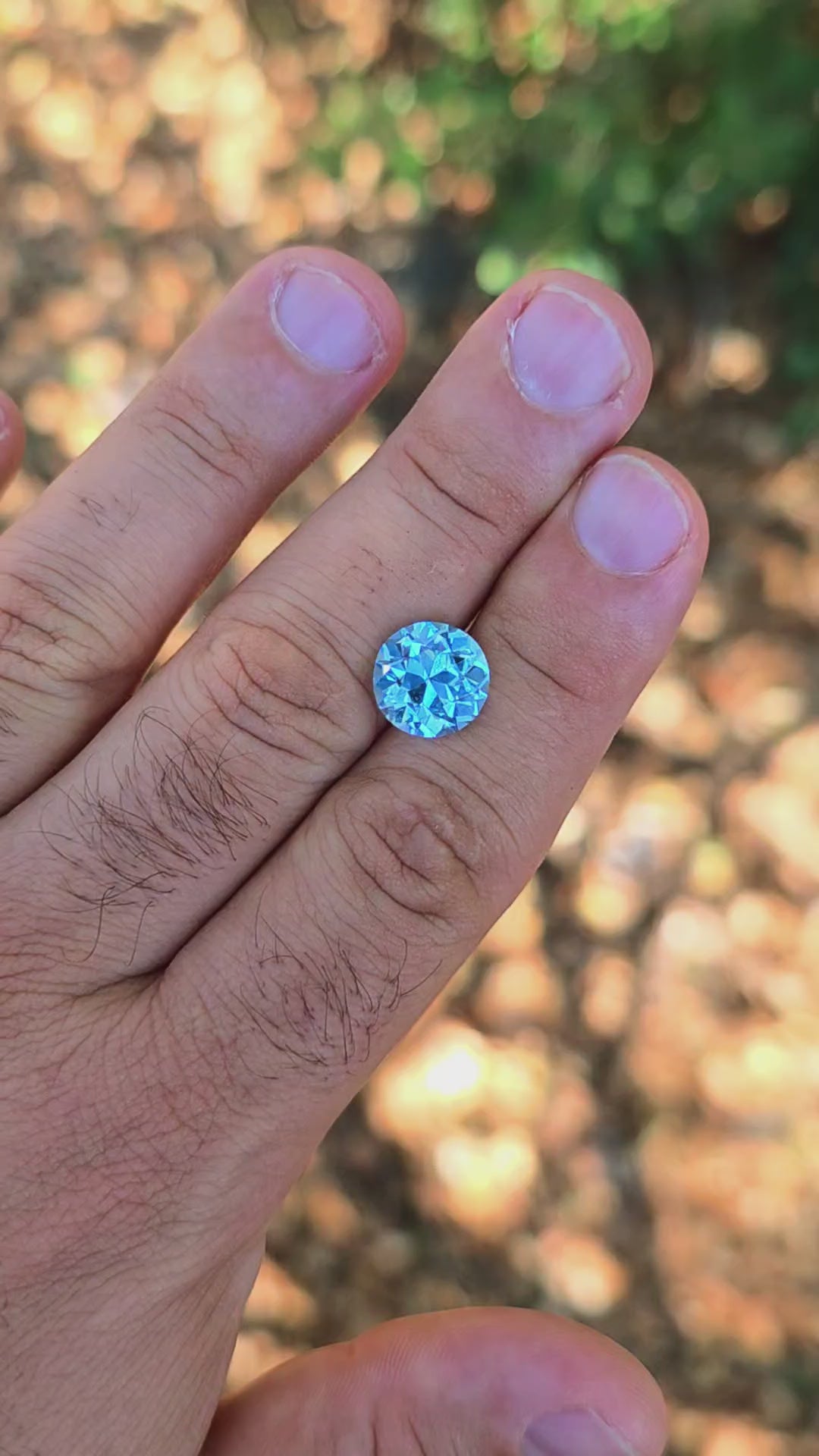 Aqua Blue Lab Sapphire, Traditional Round Brilliant Cut, 7.27 Carats