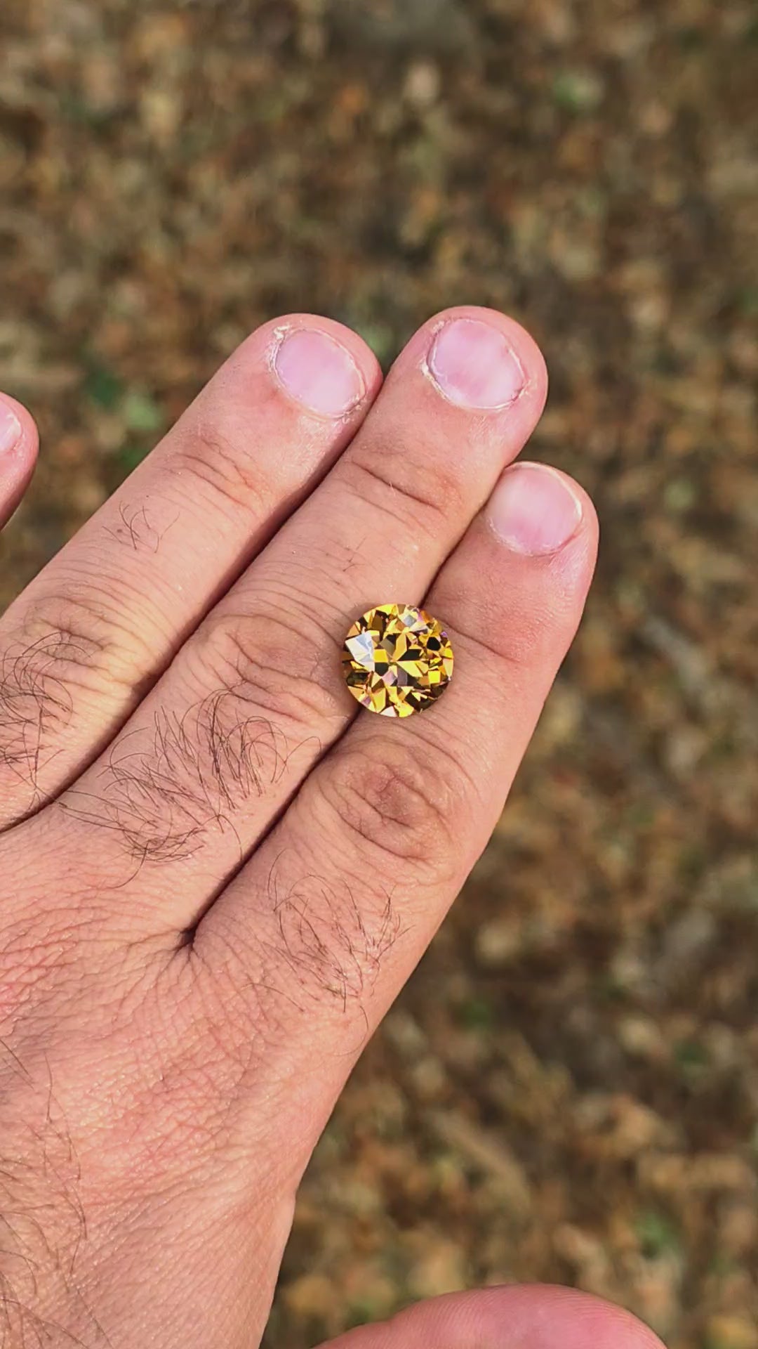 Tangerine Laser Garnet, Traditional Round Brilliant Cut, 13.77 Carats