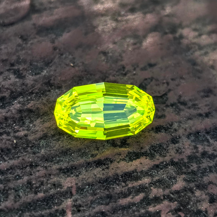 "Ultra" Glow In The Dark Lab Garnet, Long Step Oval Cut, 6.30 Carats