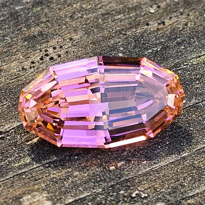 Tangerine Laser Garnet, Long Step Oval Cut, 8.41 Carats