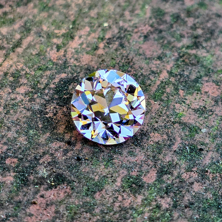 Purple Neodymium+ YAG, Traditional Round Brilliant Cut, 7.11 Carats