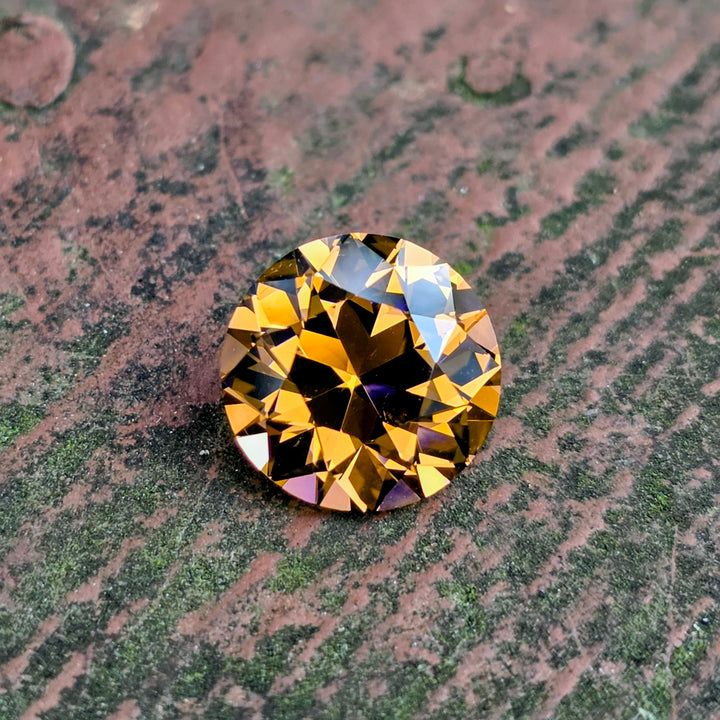 Tangerine Laser Garnet, Traditional Round Brilliant Cut, 13.77 Carats